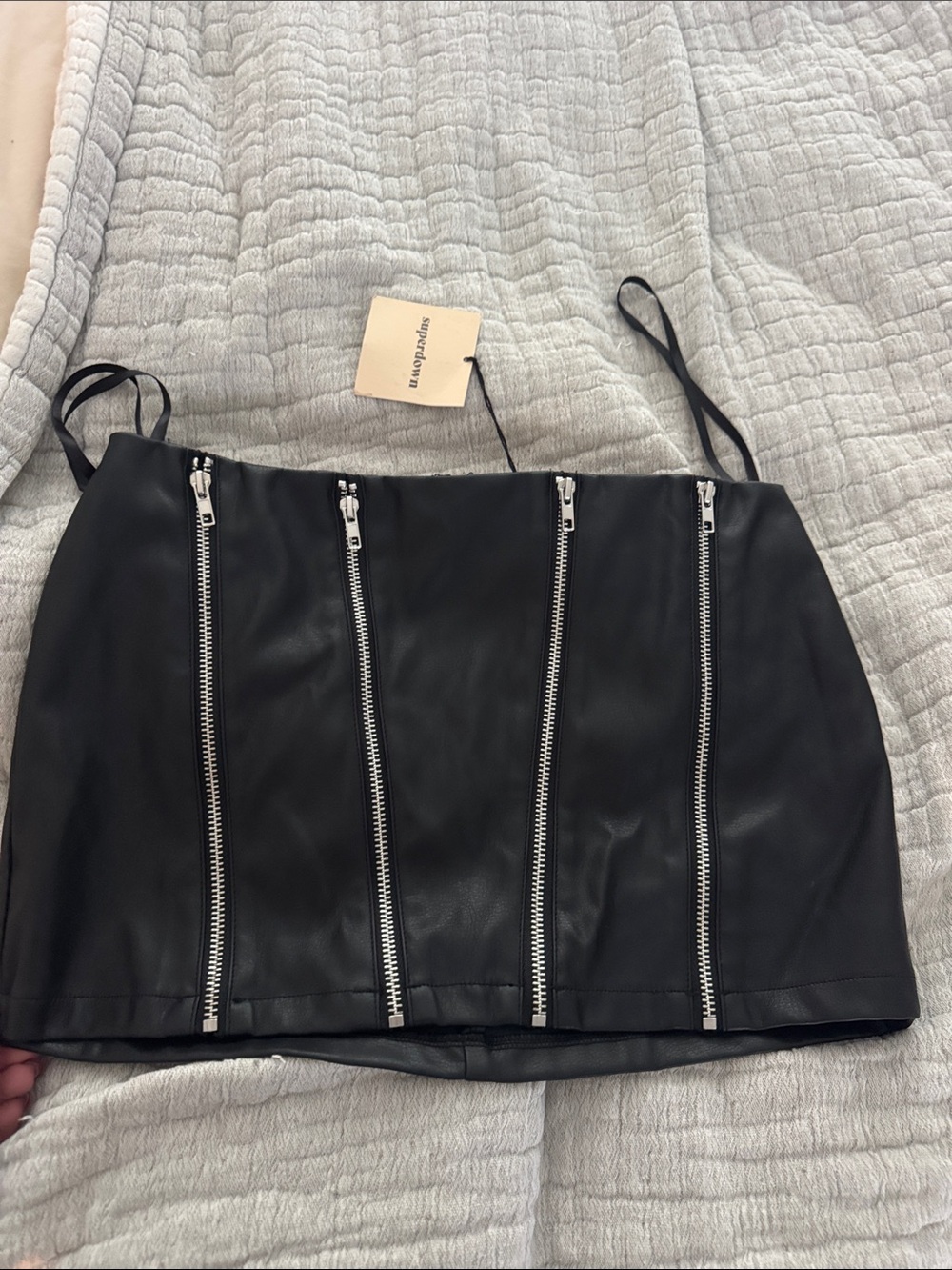 Super down small black leather skirt NWT